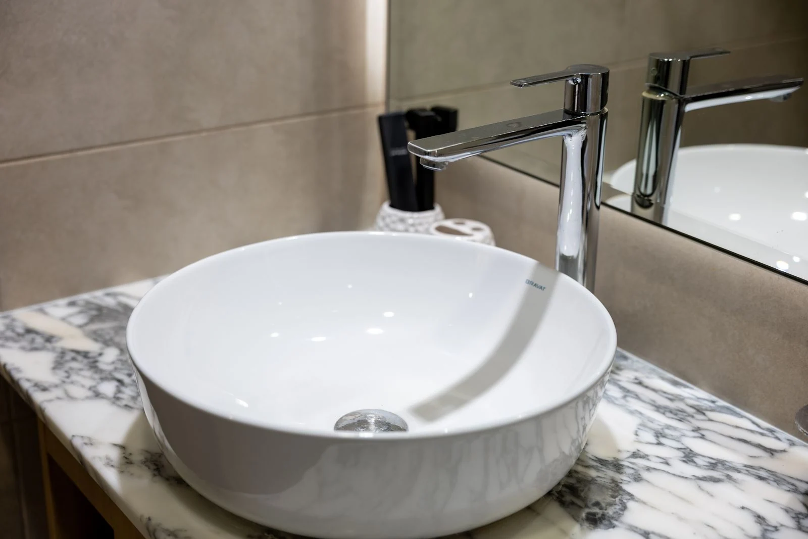 Countertop bathroom basin and tap
