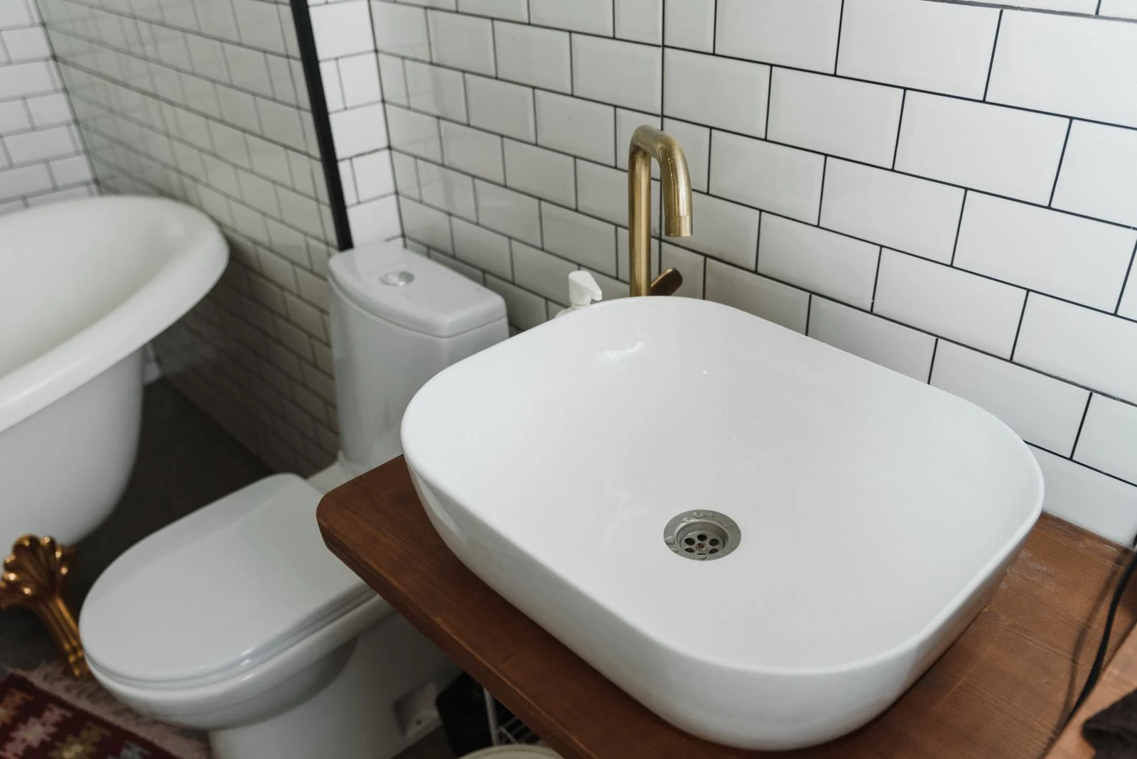 Bathroom basin beside a toilet